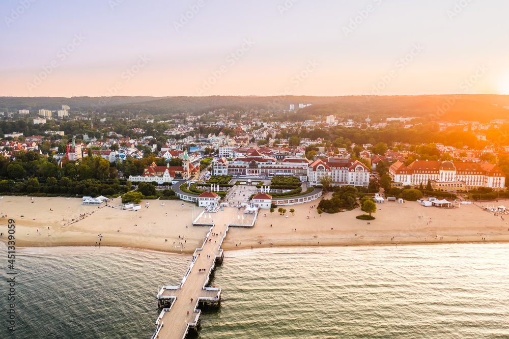 Wooden pier in Sopot in the morning with the colors of sunset. Poland. Europe - obrazy, fototapety, plakaty 