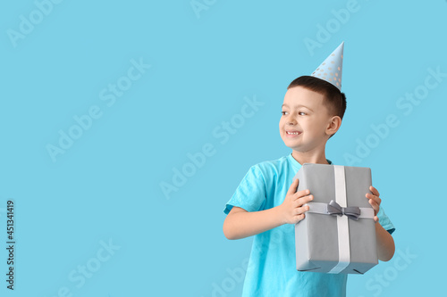 Little boy with present on ...