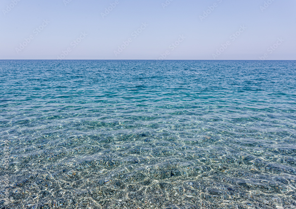 Panoramic view of a clear sea. Blue and crystalline Tyrrhenian Sea. Calabria, Italy
