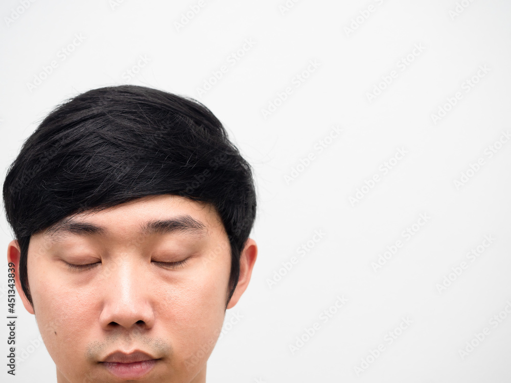 Close up face asian man close eyes head shot white background copy space Close up face asian man close eyes head shot white background copy space