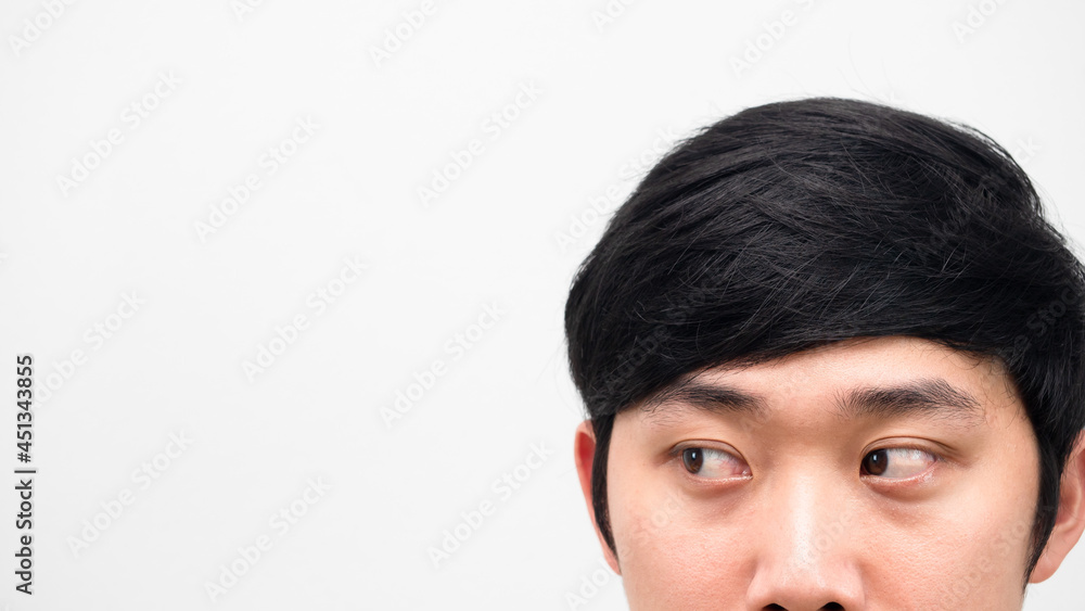 Close up face asian man head shot looking at space white background copy space Close up face asian man head shot looking at space white background copy space