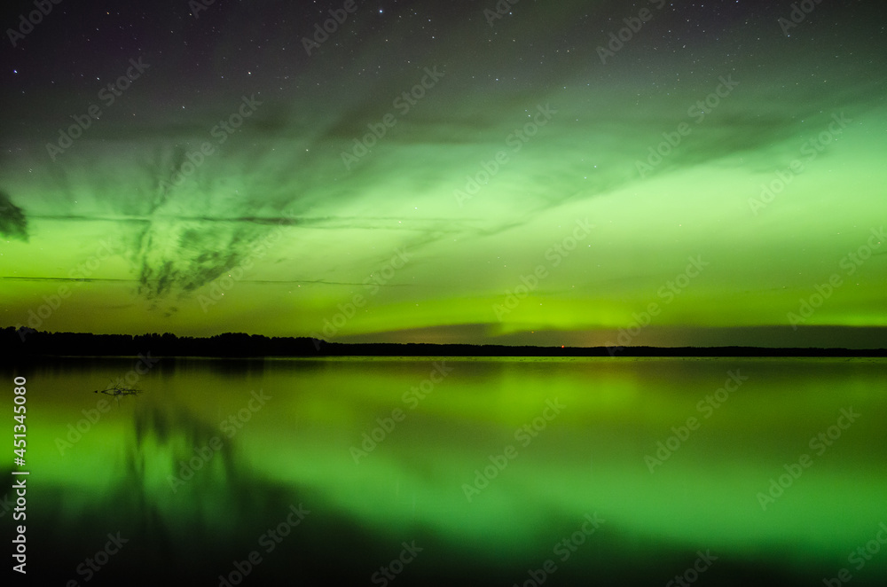 Aurora borealis, The Northern lights at the lake, Latvia. Aurora borealis, The Northern lights at the lake, Latvia.