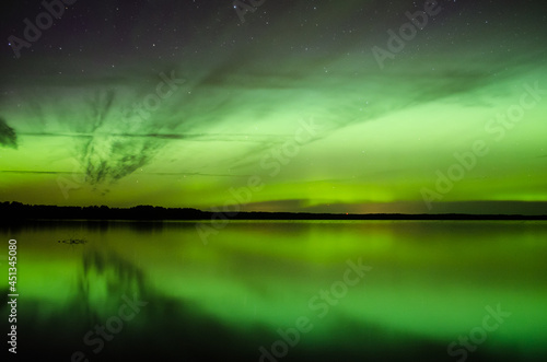Aurora borealis, The Northern lights at the lake, Latvia.