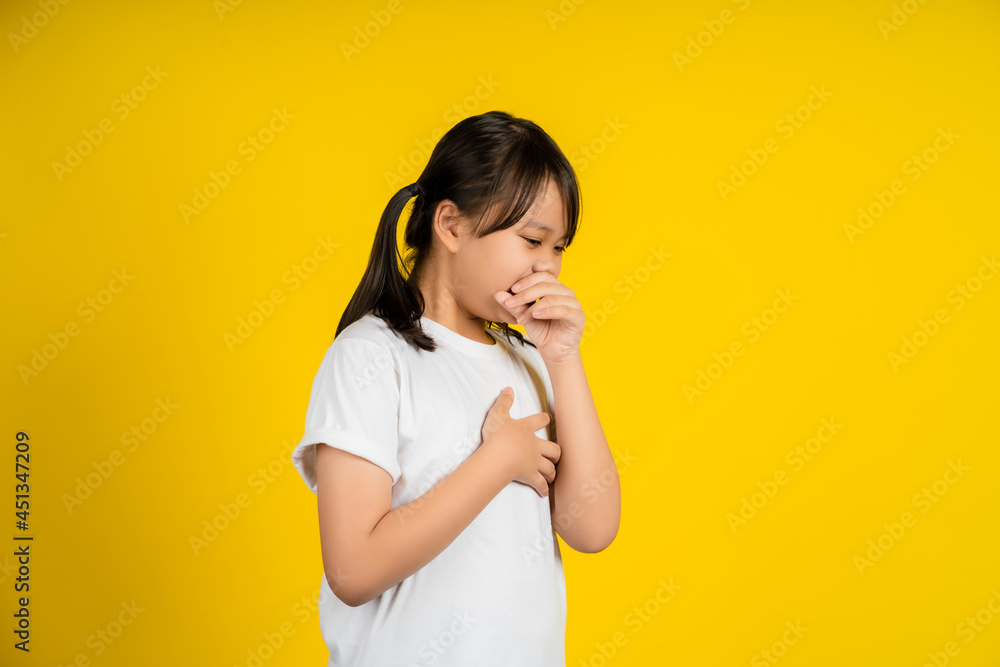 Little girl coughing on color background Little girl coughing on color background