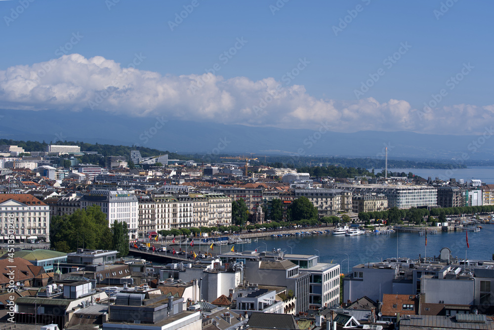 Lake Geneva and river Rhone at City of Geneva on sunny summer morning. Photo taken July 29th, 2021, Geneva, Switzerland.