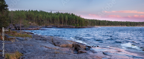 Cape Besov nose in Lake Onega in Karelia in northern Russia at summer sunset