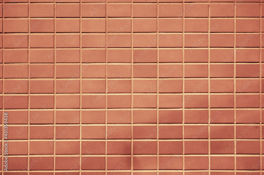 Red antique brick tile wall texture background. Facade with vintage tile walls Red antique brick tile wall texture background. Facade with vintage tile walls
