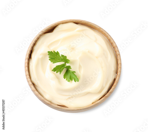 Bowl with delicious mayonnaise and parsley isolated on white, top view