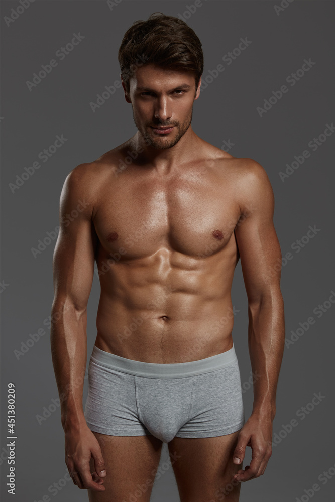 Fototapeta premium Young european man with naked sportive torso