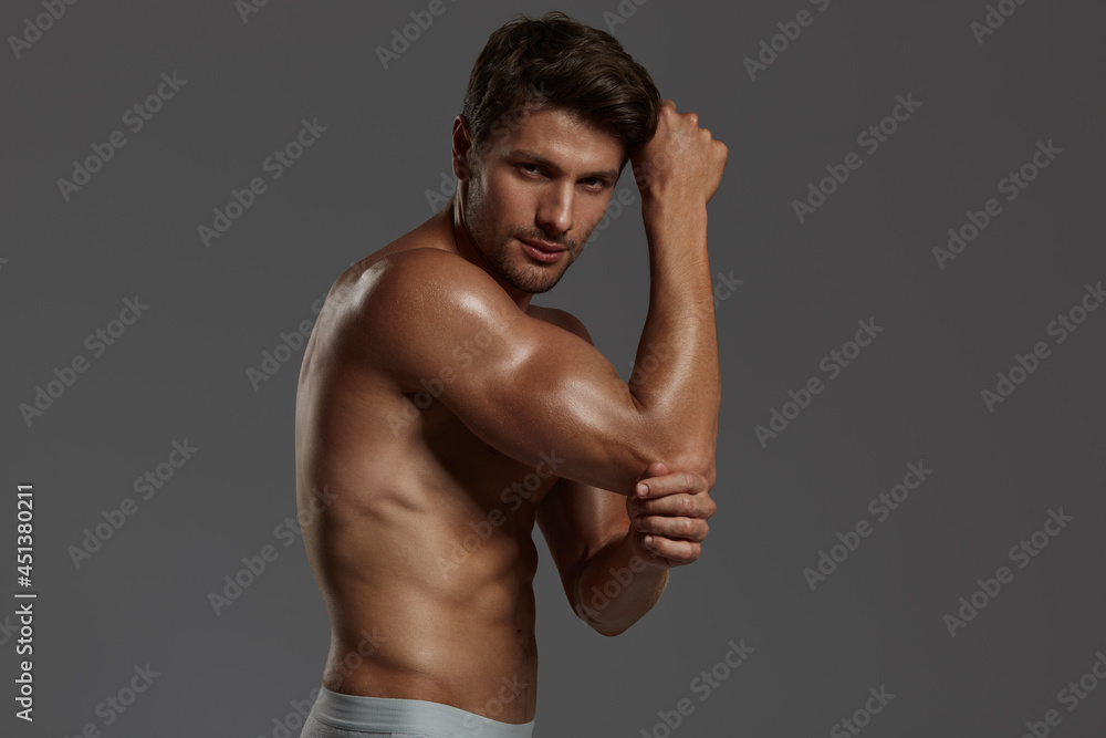 Fototapeta premium Young european man with naked sportive torso