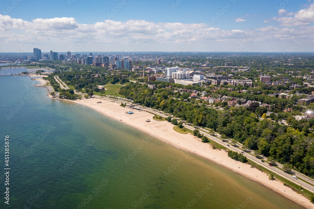 Aerial view Lake Michigan coastline featuring Lake Park, Bradford Beach and downtown Milwaukee skyline.