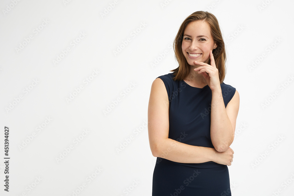 Confident woman standing smiling to the camera Confident woman standing smiling to the camera