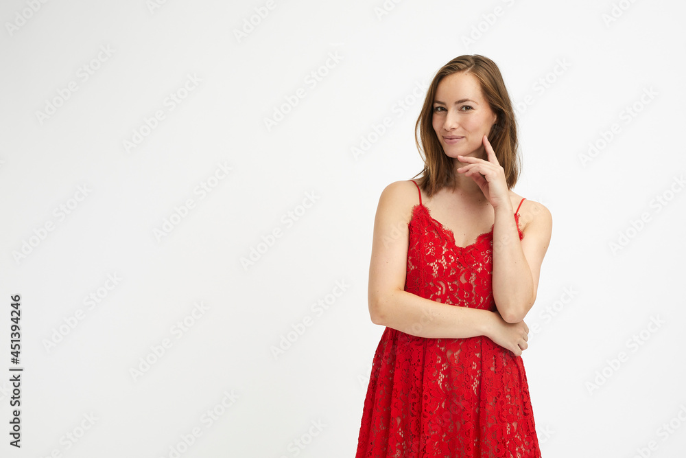 Sexy and elegant woman in red evening dress ready to go out for party Sexy and elegant woman in red evening dress ready to go out for party