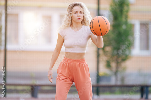 Portrait of young female basketball player.