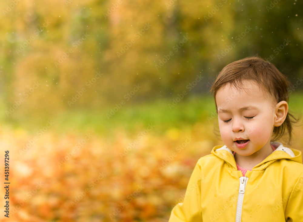 Girl stands with closed eyes in autumn Girl stands with closed eyes in autumn
