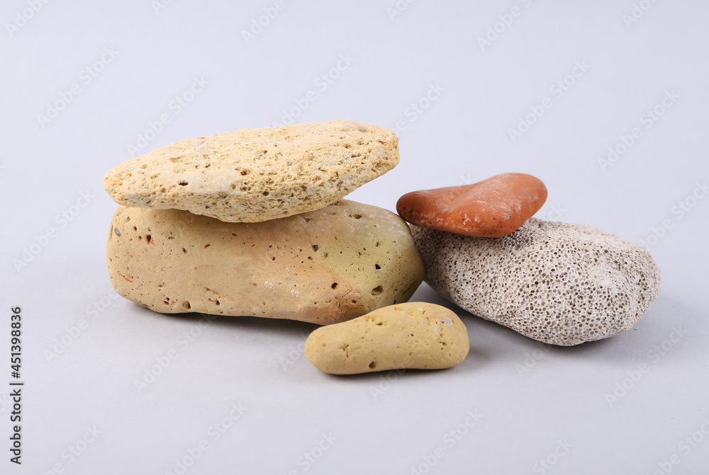 Natural sea stones on a gray background Natural sea stones on a gray background