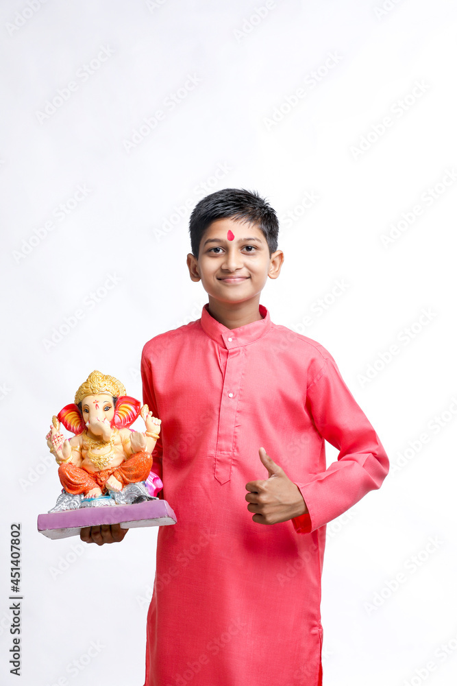 Indian little child celebrate lord ganesha festival Indian little child celebrate lord ganesha festival