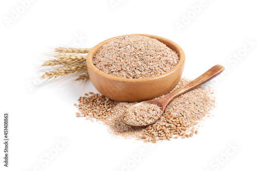 Wheat bran and spikelets on white background