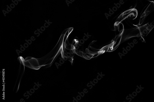 Smoke, clouds in a black background.