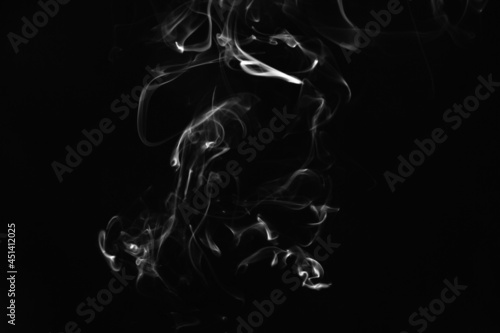 Smoke, clouds in a black background. © Ayii