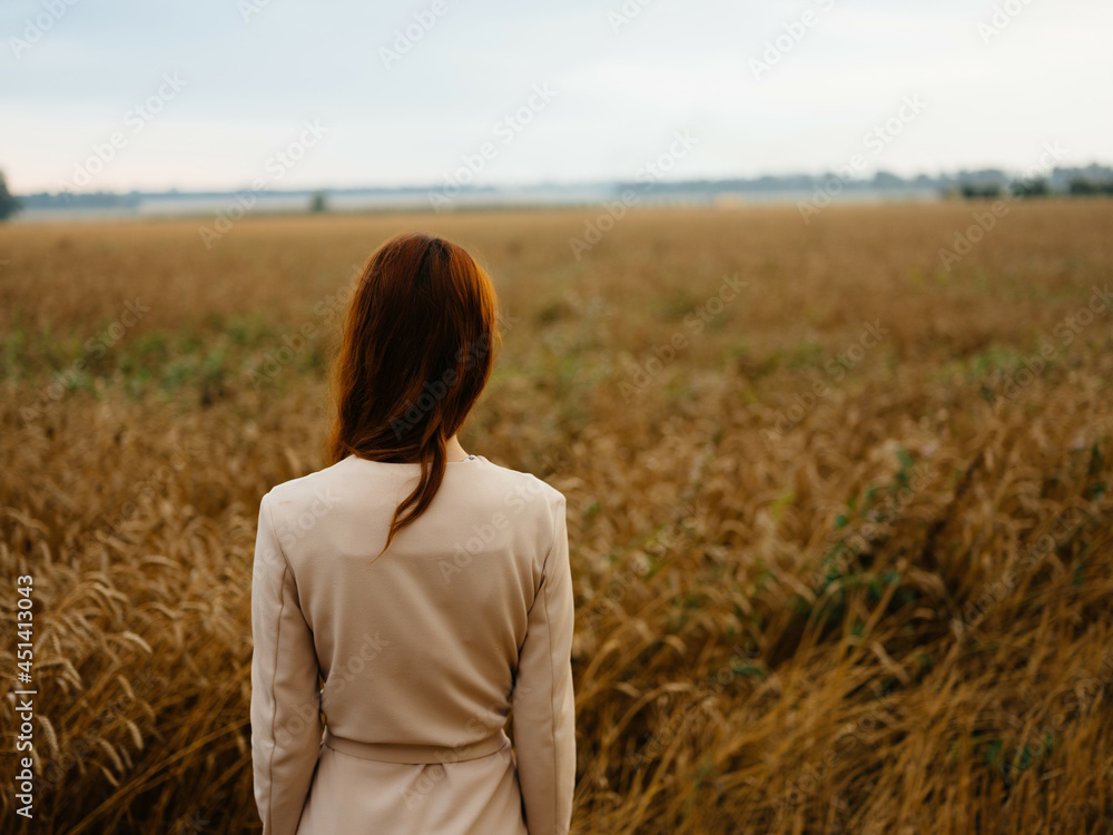 woman in dress in the field nature agriculture freedom woman in dress in the field nature agriculture freedom