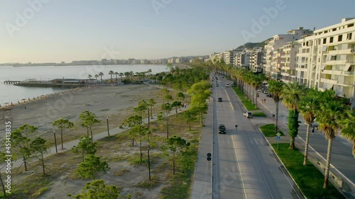 Aerial view of Cameria Road (Rruga Cameria). Road running along the coast of the Adriatic Sea. Main road in Vlore city, with palm trees photo