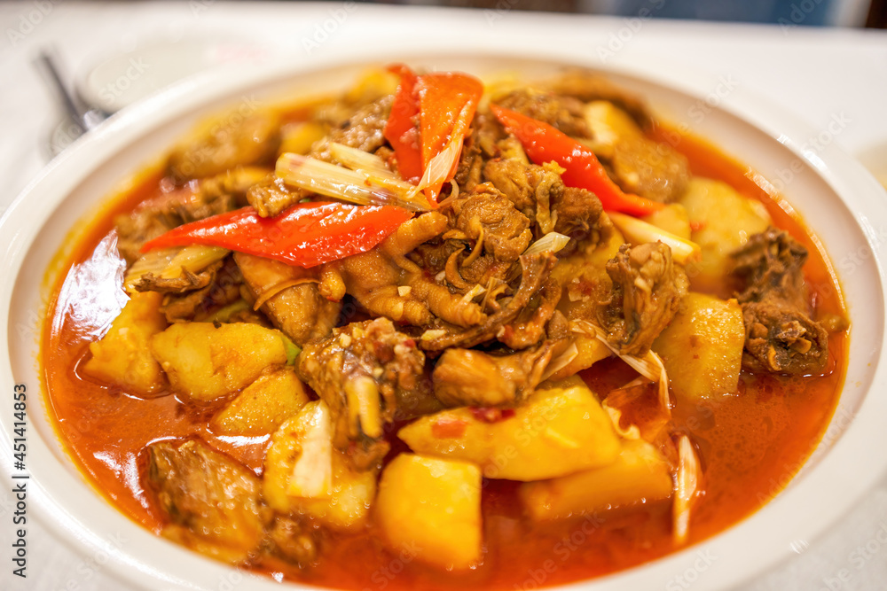 A delicious Chinese dish, Xinjiang potato chicken A delicious Chinese dish, Xinjiang potato chicken