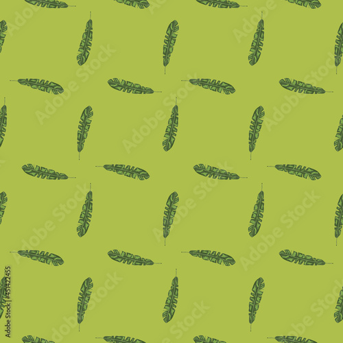 Geometric style seamless pattern with doodle tropic leaves print. Green background. Floral botany backdrop.