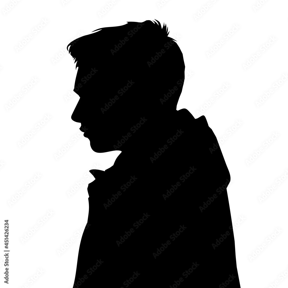silhouette of a handsome teenage boy wearing a hoodie