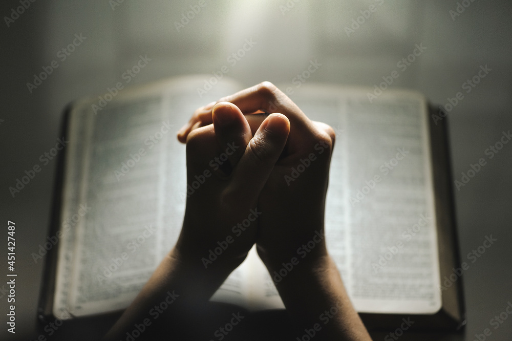 Women pray from god blessing to have a better life. Women hands praying