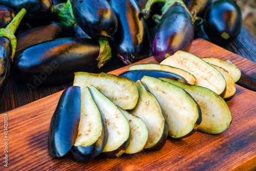 Fresh eggplant sliced lengthwise