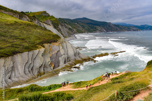 Flysch rock formations in the Basque Coast UNESCO Global Geopark between Zumaia and Deba, Spain photo