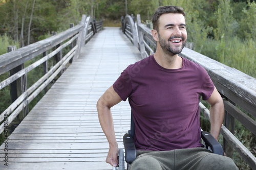 Young handsome man on a wheelchair