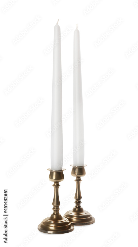 Elegant candlesticks with candles on white background Elegant candlesticks with candles on white background