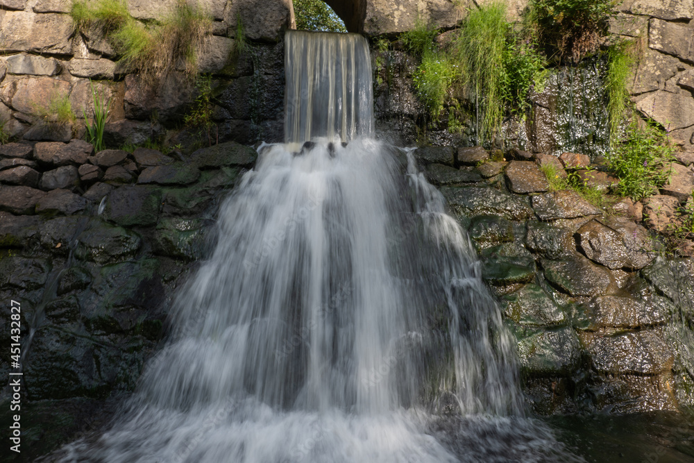 Fototapeta premium Details of a beautiful waterfall in a countryside