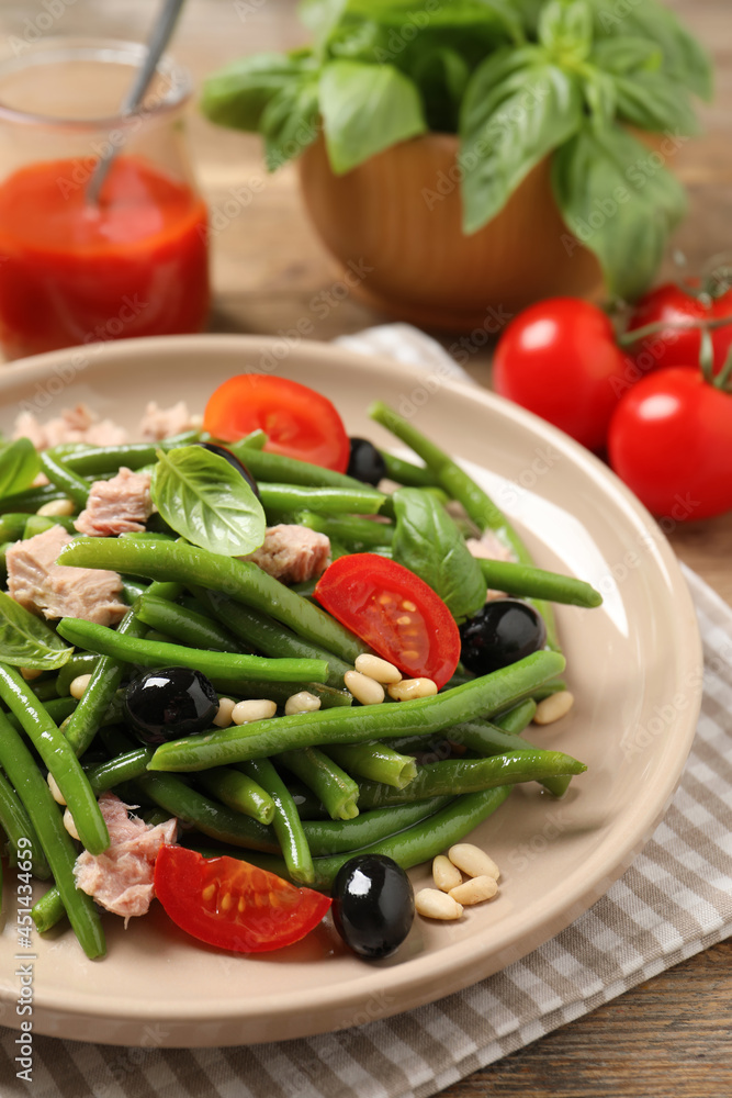 Tasty salad with green beans on table Tasty salad with green beans on table