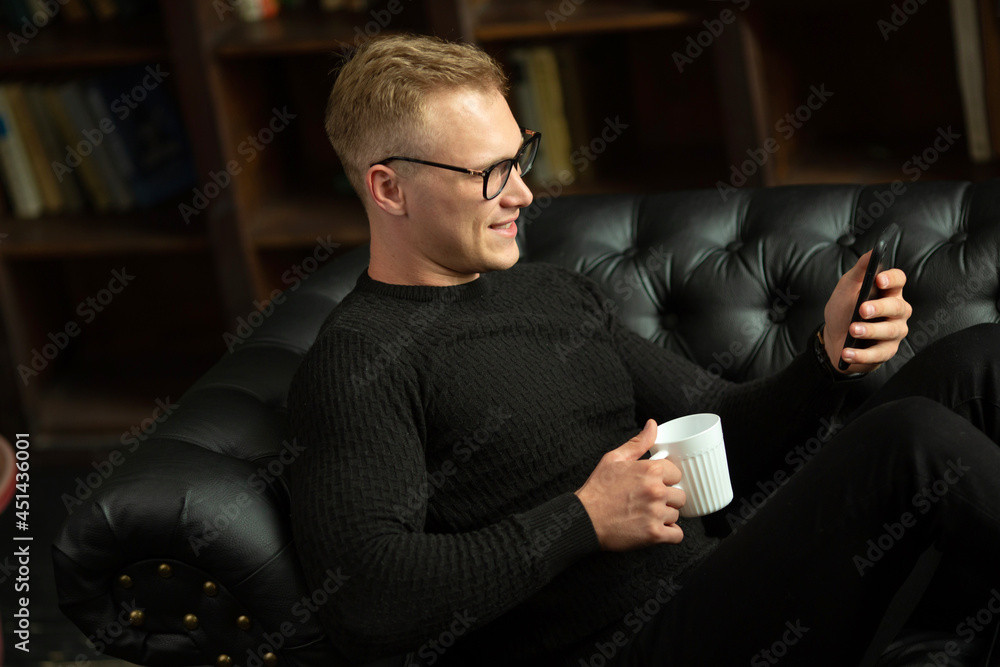 portrait of handsome caucasian man wearing glasses with mobile phone portrait of handsome caucasian man wearing glasses with mobile phone