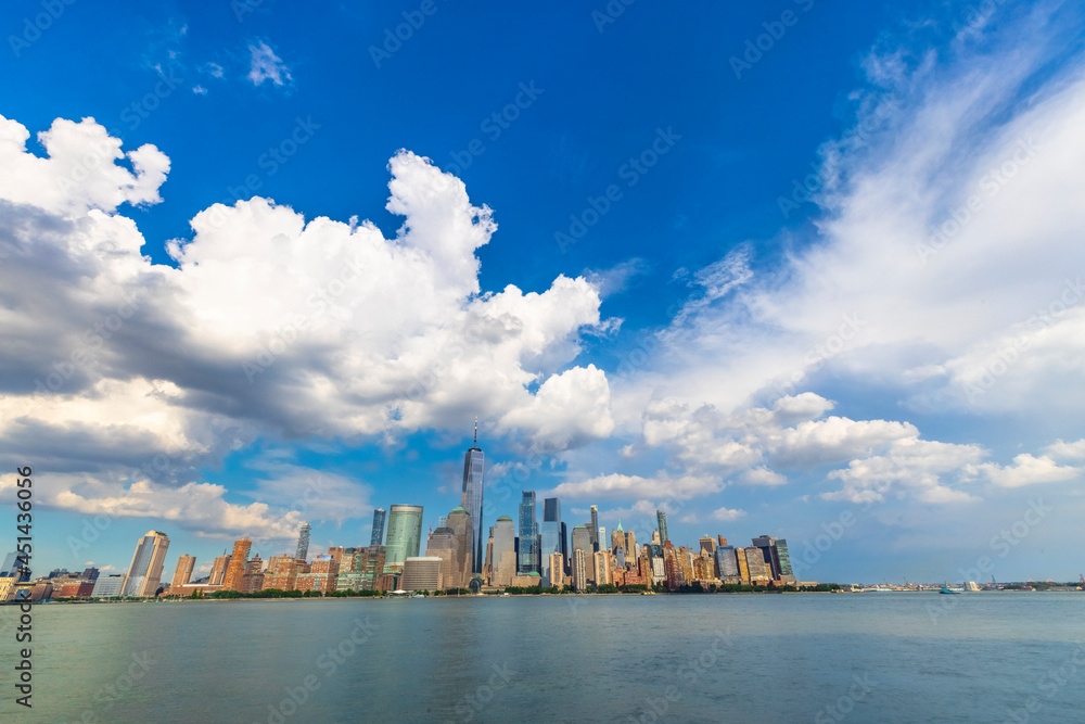 Summer clouds cover the Lower Manhattan skyscraper on June 9 2021 in New York City NY USA.