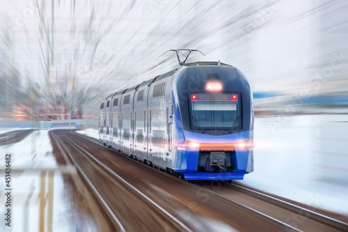 Modern high speed train in motion blur. Passenger Transportation.