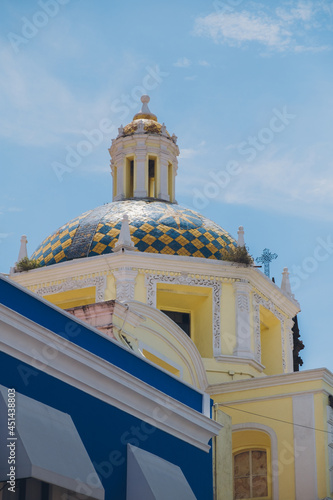 Iconic church with blue and yellow tones