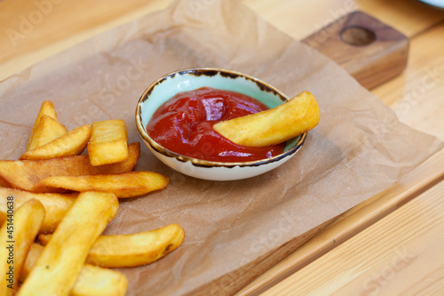 French fries with ketchup in a restaurant