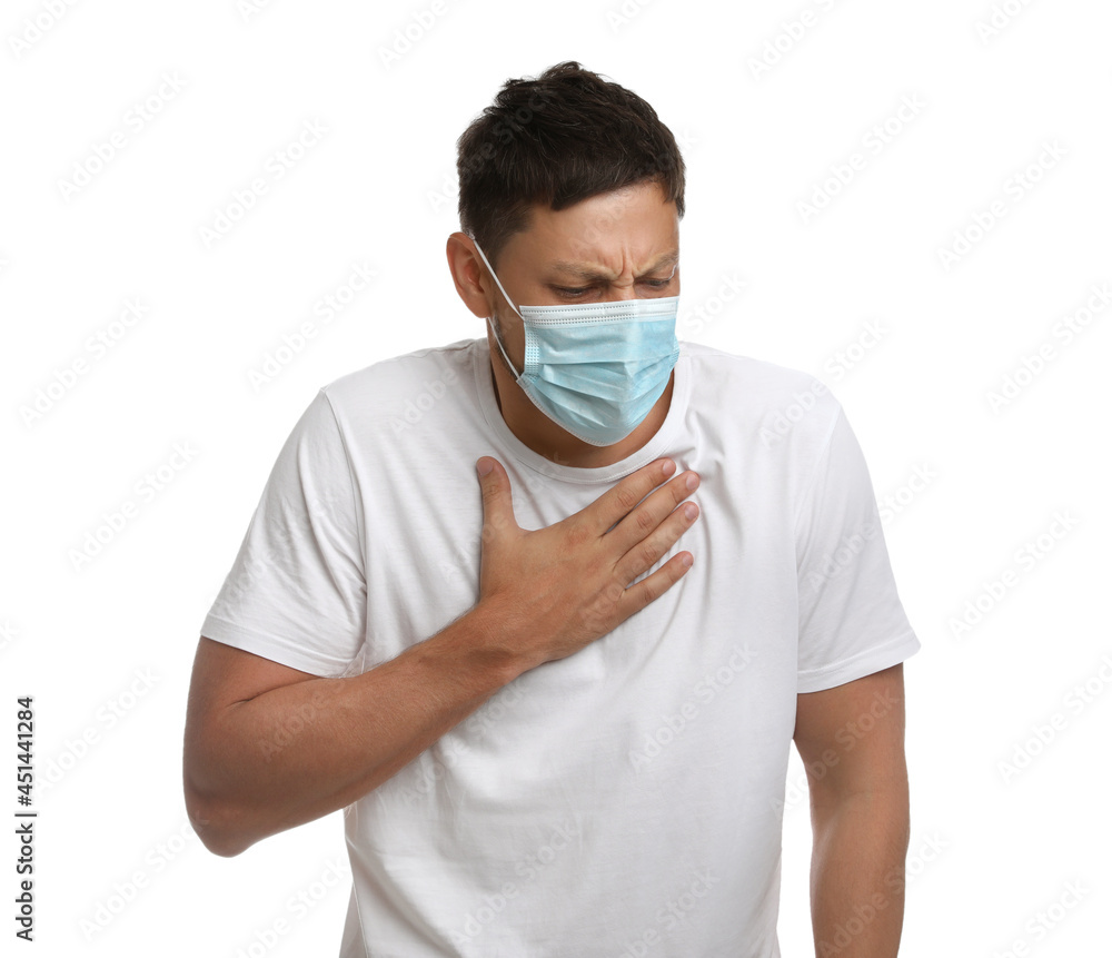 Man in medical mask suffering from pain during breathing on white background Man in medical mask suffering from pain during breathing on white background