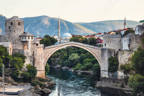 Mostar town in Bosnia and Herzegovina with famous stone bridge  minarets and medieval buildings