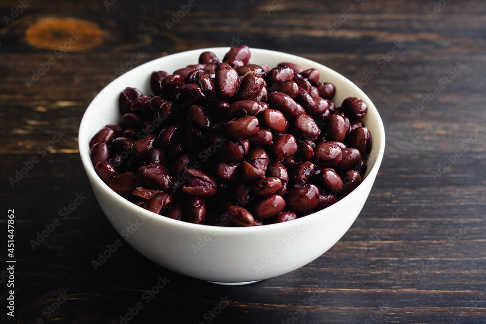 Small Bowl of Drained and Rinsed Canned Black Beans: Unseasoned cooked black beans in a small white ceramic bowl Small Bowl of Drained and Rinsed Canned Black Beans: Unseasoned cooked black beans in a small white ceramic bowl