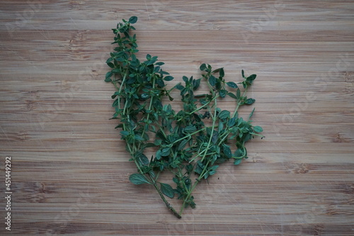 Lemon thyme on wooden board