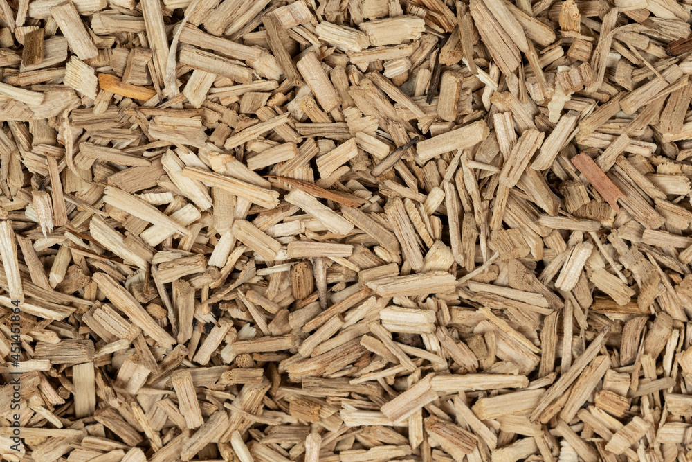 Oak chips sawdust texture. small wood chips for smoking. sawdust background. ecological fuel Oak chips sawdust texture. small wood chips for smoking. sawdust background. ecological fuel