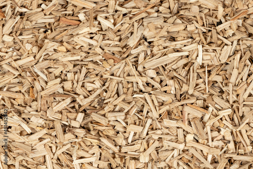 Oak chips sawdust texture. small wood chips for smoking. sawdust background. ecological fuel Oak chips sawdust texture. small wood chips for smoking. sawdust background. ecological fuel