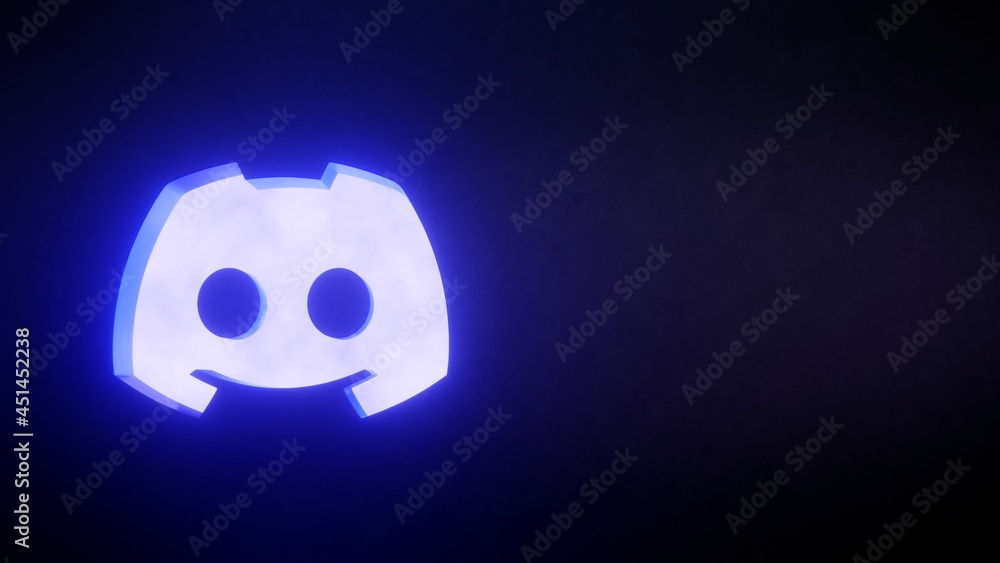 Carved out Discord logo with illumination effect. Editorial 3d ...