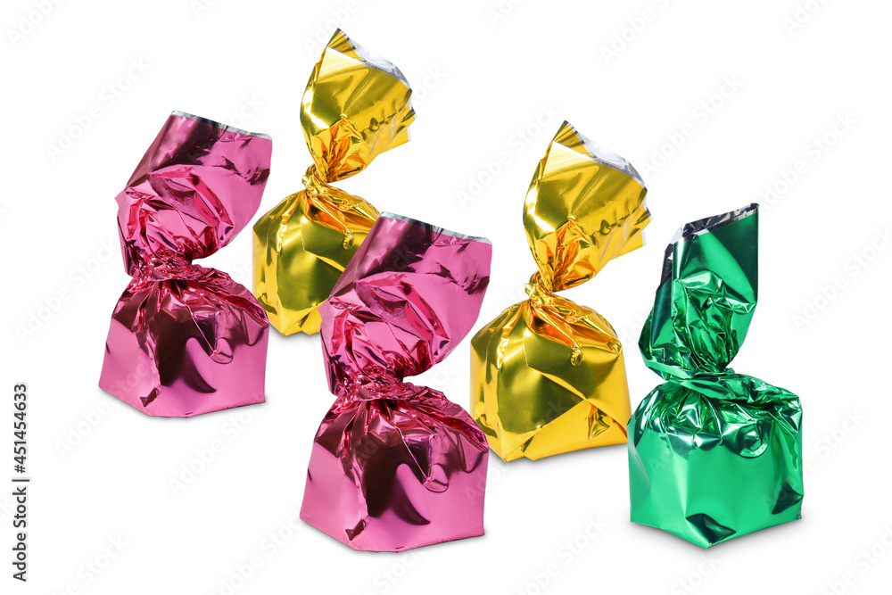 candies in colorful wrapper isolated on white background. candies in colorful wrapper isolated on white background.