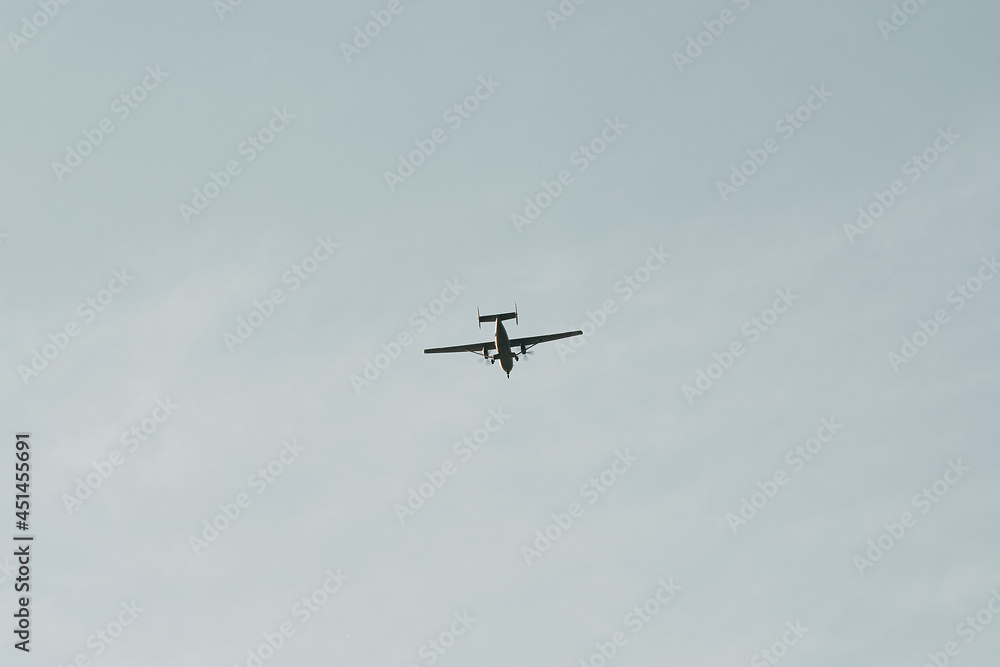 Small aircraft in the sky. Concept of summer vacation travel Small aircraft in the sky. Concept of summer vacation travel
